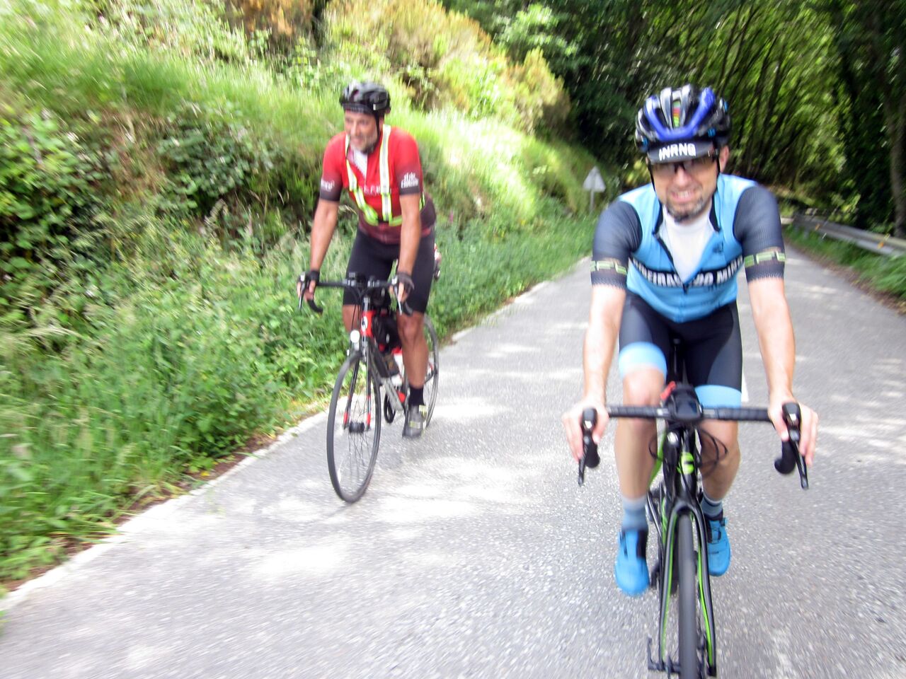 Dani and me, riding through the natural tunnel made by trees, under a nice and fresh shade