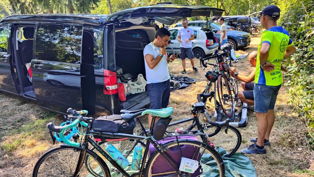 Everybody working on their bikes, to get things ready before lunch