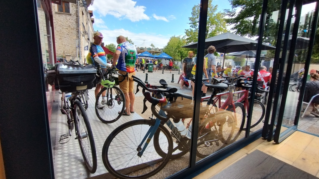 A view of bikes and randonneurs from inside the restaurant where we had lunch