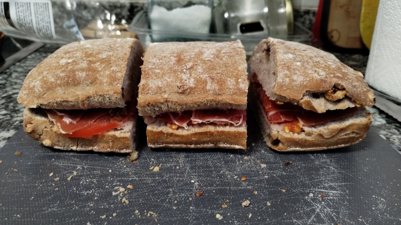 A picture of the 'bocadillo de jamon', already cut into three pieces, before packing it up to bring with me