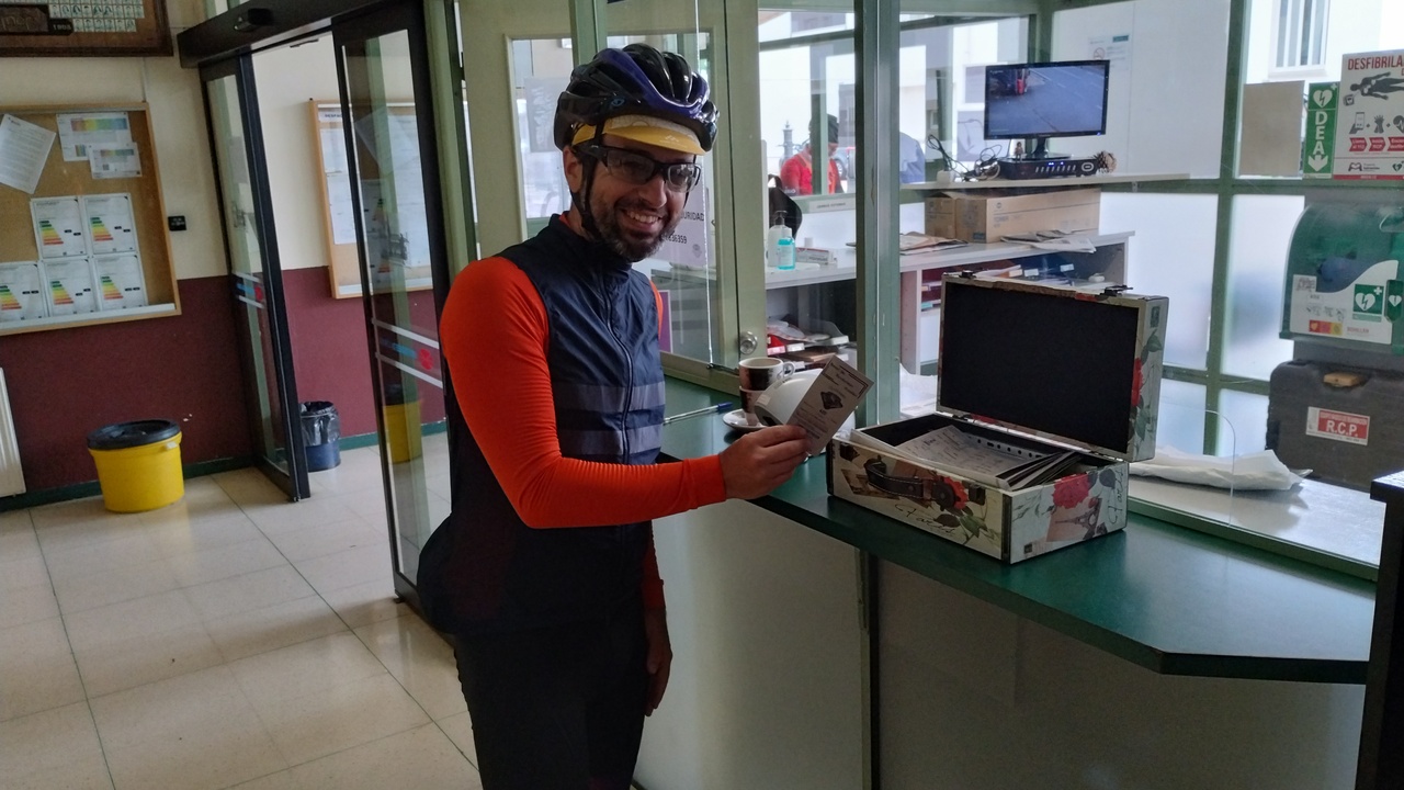 Me, delivering the Brevet card into the suitcase