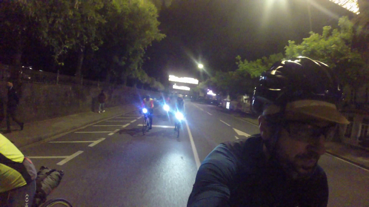 Me, being chased by a few head lights down the avenue of Rosalia de Castro in Santiago. There are trees on both sides of the avenue