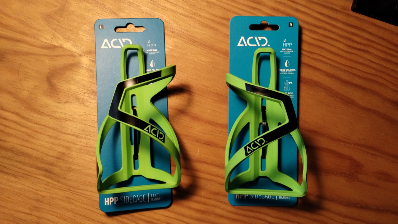 A couple of CUBE ACID bottle 'side' cages. One for the left hand, one for the right hand. This way, putting one in the down tube and another one in the seat tube, both would be open to the same side - right in my case