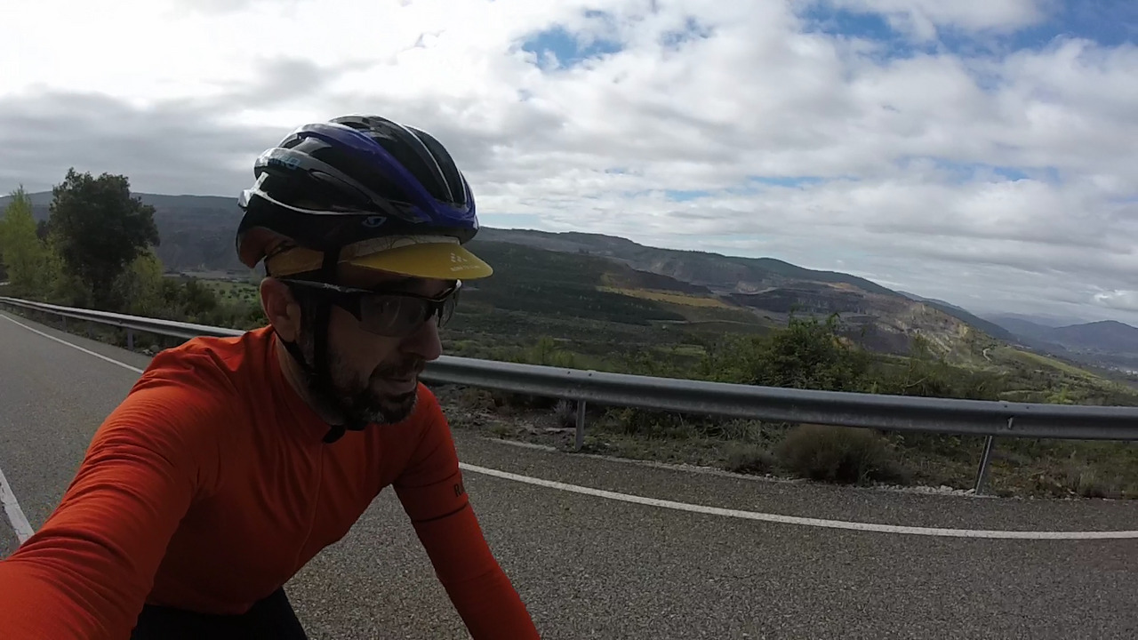 Me, going up the last bit of climb by Fabero. There is a view of the valley below and the mountains on the other side, behind me