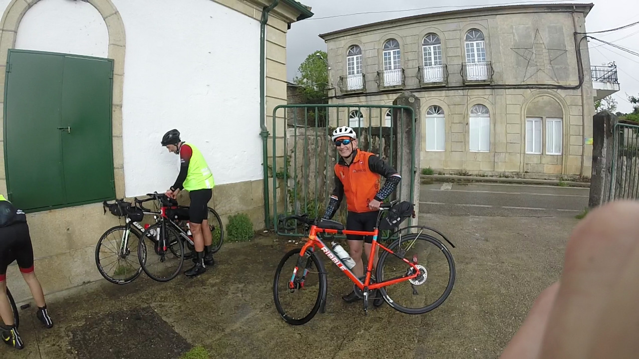 Graeme looks happy even being completely wet due to the rain