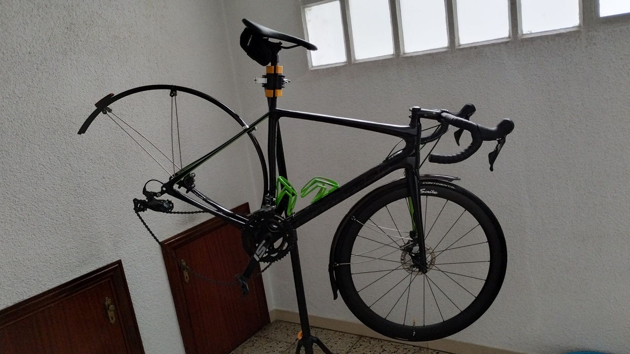 The synapse on the stand, rear fender installed, without the rear wheel in place