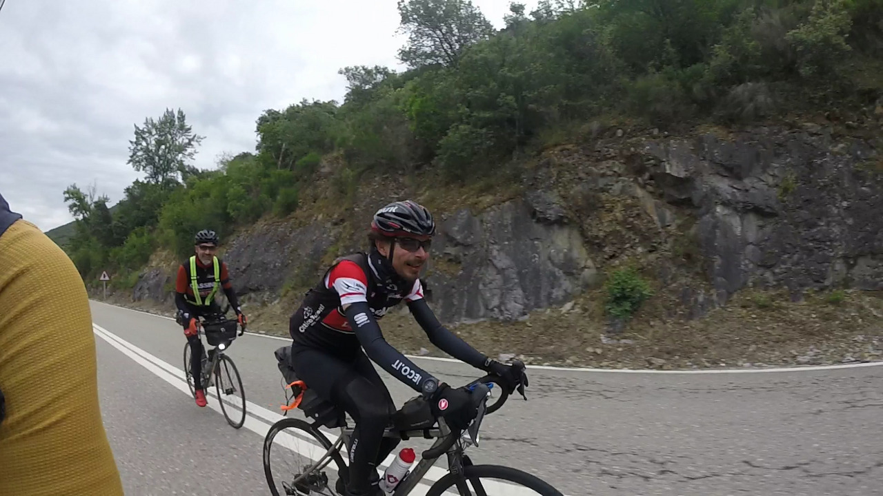 Emmanuelle - on the back - and Maximilian - on the front - riding near me on our way to Puente de Domingo Florez