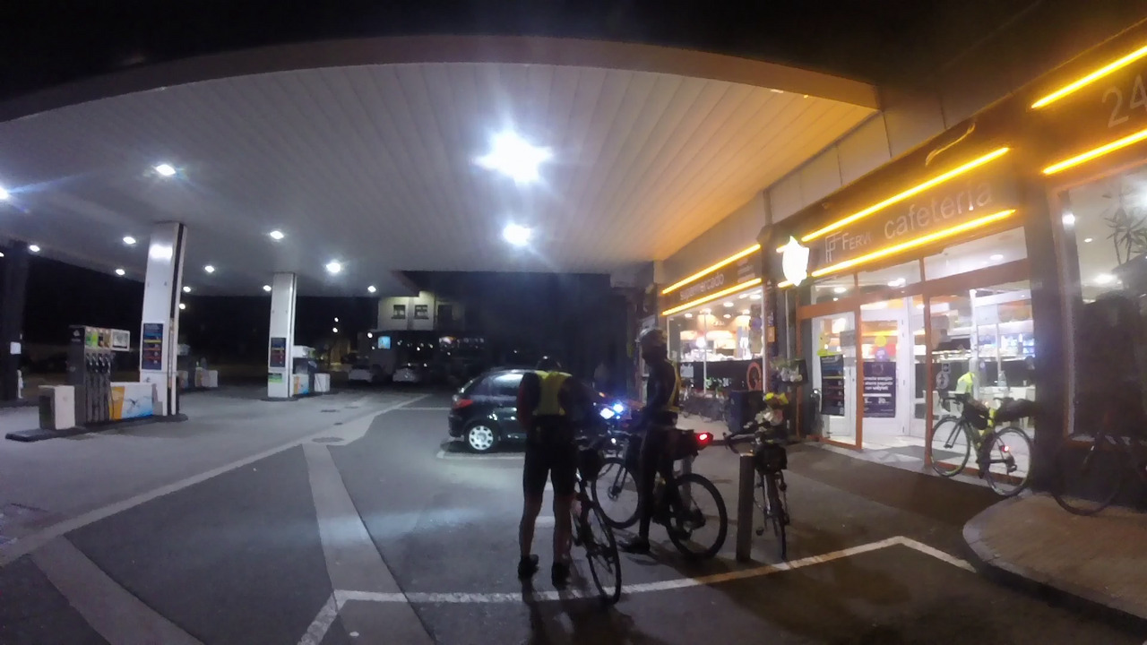 Óscar and Alex, getting ready to leave the gas station after our stop. A few other bikes are parked near them