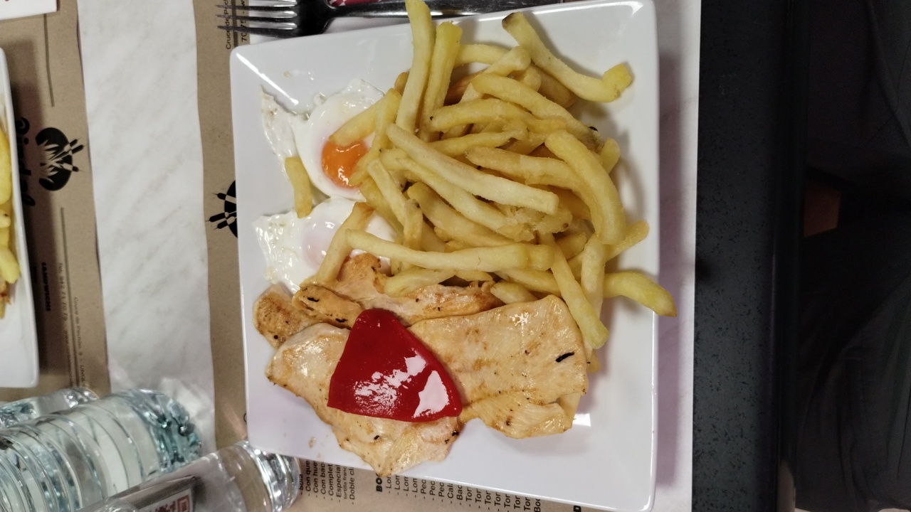 My lunch, chicken, a couple fried eggs and potatoes