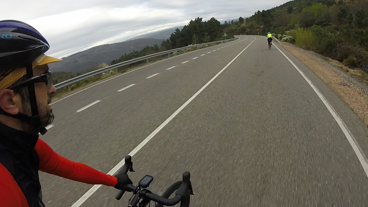 Me on the left, going down puerto del Manzanal on a big open road, Dani is a little dot on the right side of the picture, far ahead from me.