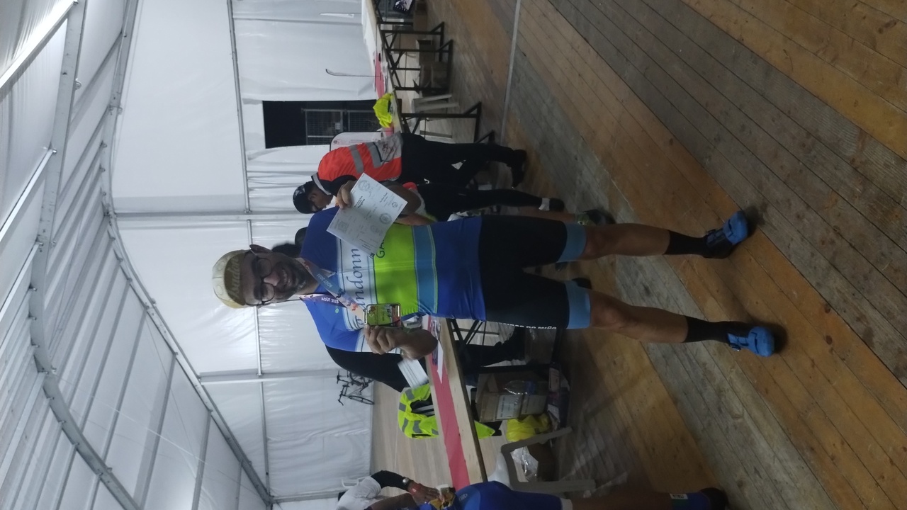 Me, after finished PBP in 78 hours, with my Brevet booklet and medal.
