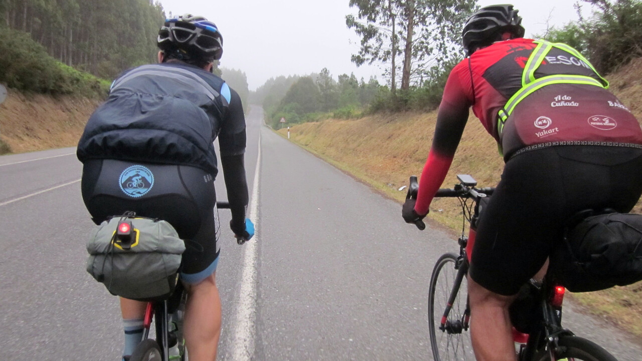 A picture of me and Dani riding together, taken from behind. Look at my rear light, it is not pointing to the sky!