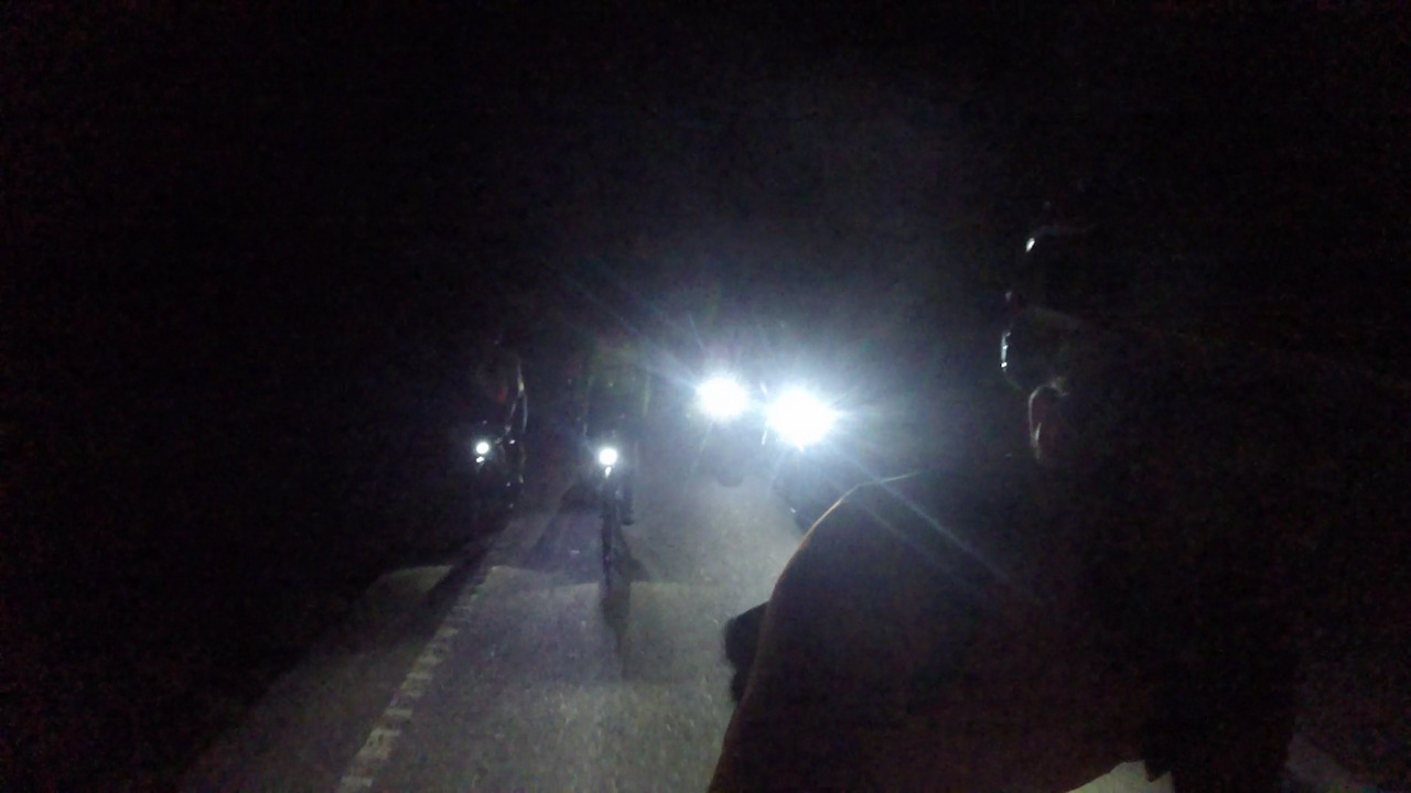 A few head lights chasing me on our way to the top of alto de dozón