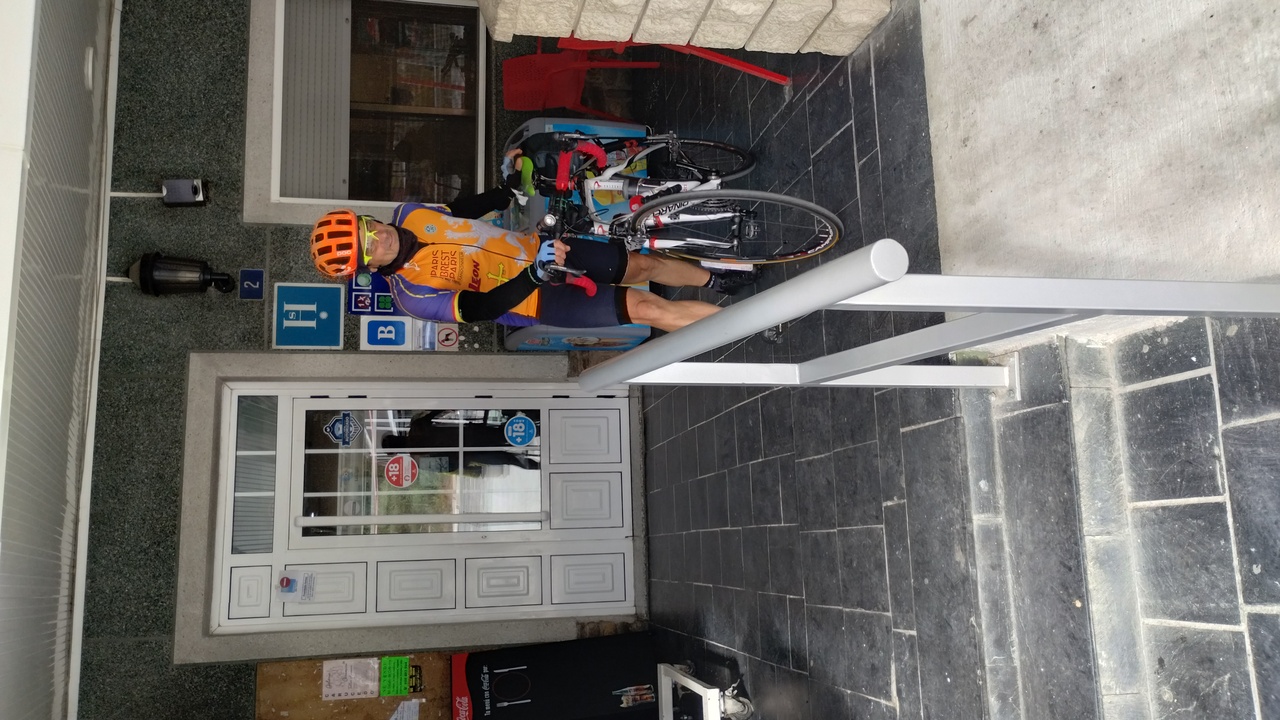 Saúl and his pinarello road bike, leaving the café in Puente de Domingo Florez