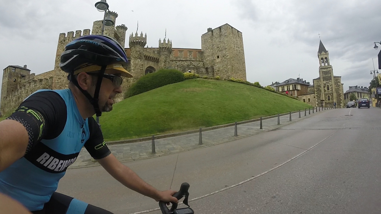 Me, riding by the castle in Ponferrada