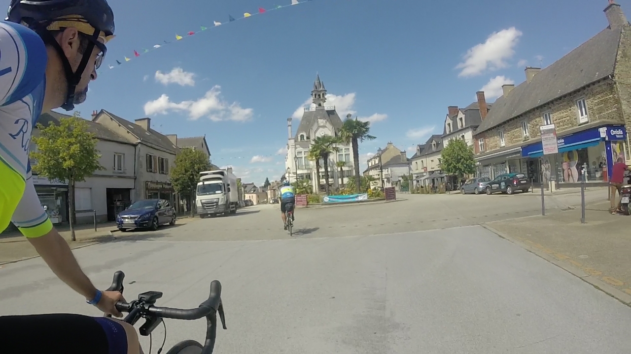 Me, chasing Ferreiro through the main square in Saint Mèen Le Grand
