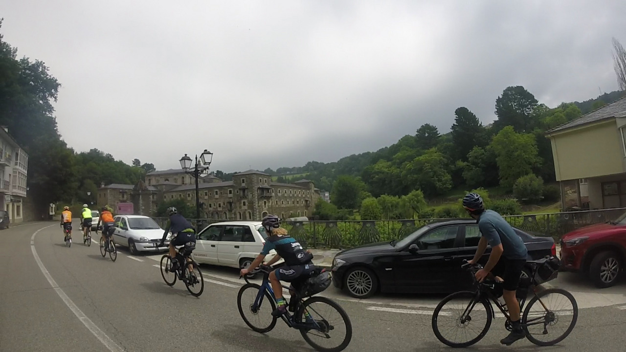 Our group, riding in a line, passing by the old monastery in Samos