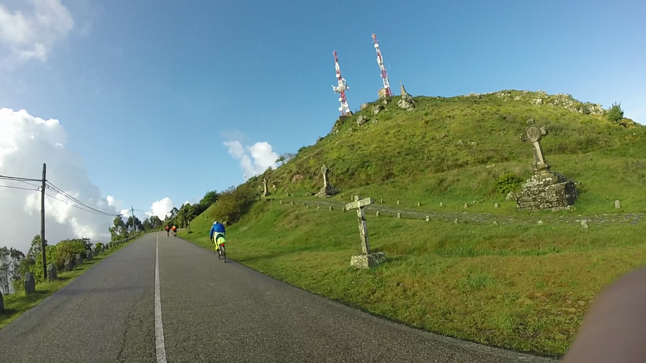 The last part of the road up to the top in Santa Trega, passing some stone crosses to our right