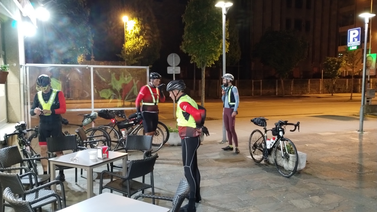 Oscar, Dani, Jose and Alex, just after arriving in the cafe in Santiago, sorting things out and sending messages home