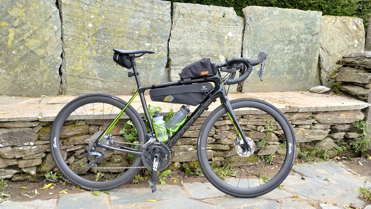 The synapse, loaded for a test, racing frame pack, top tube bag, and two bottles in their bottle cages
