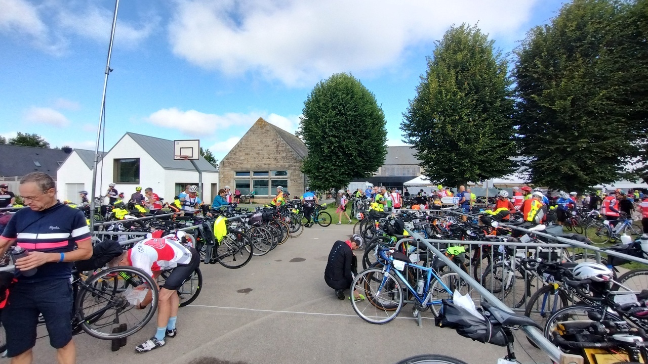 Randonneurs everywhere, parking their bikes or picking them up for resuming their rides