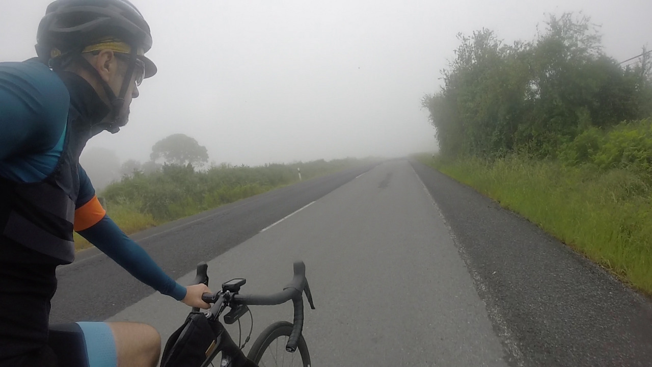 Myself, riding towards the fog, on our way to Palas de Rei