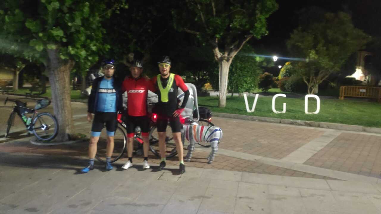 Blurry picture of Me, Jose and Oscar, with the cows sculpture in Vegadeo